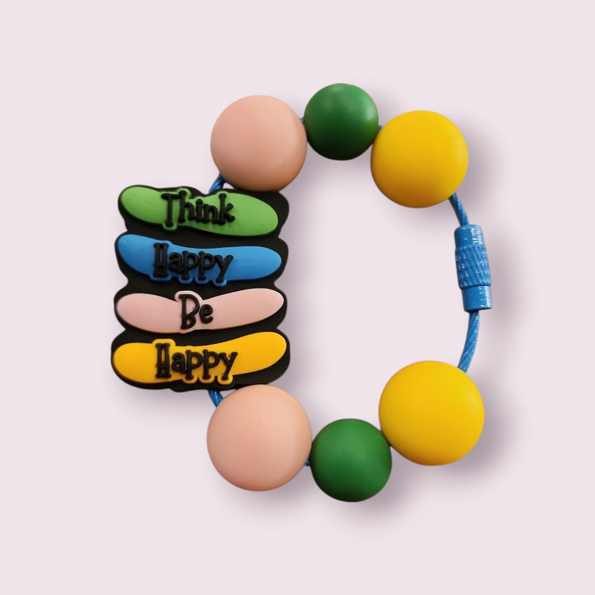 Colorful silicone bracelet with 'Think Happy Be Happy' charm, round beads, and blue cord.