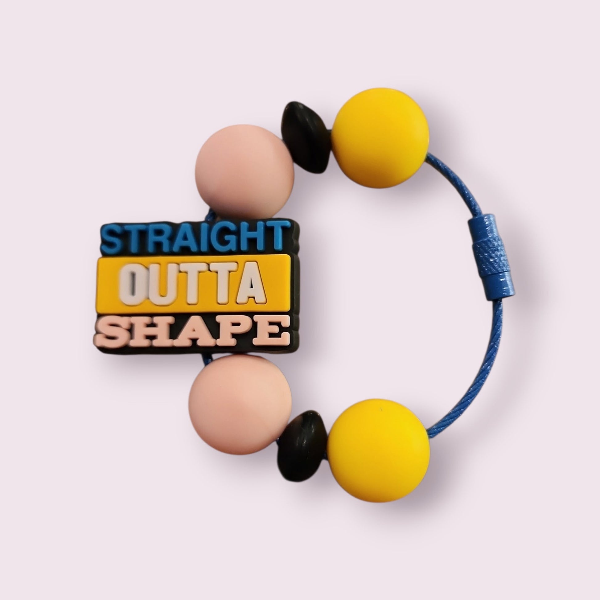 Colorful 'Straight Outta Shape' beaded bracelet with yellow, pink, and black beads on blue cord