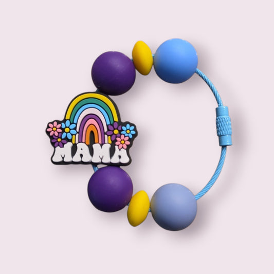 Colorful silicone teething bracelet with rainbow, flowers, and 'MAMA' charm for mom