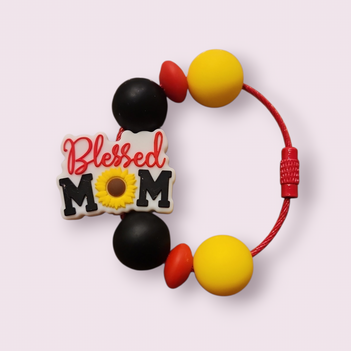 Blessed Mom silicone teething bracelet with sunflower charm, black, red, and yellow beads