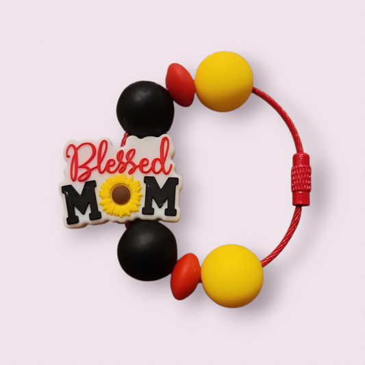 Blessed Mom silicone teething bracelet with sunflower charm, black, red, and yellow beads